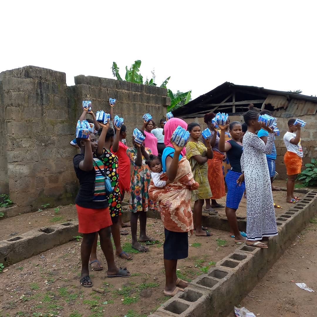 Why do girls need sanitary pads to stay in school?